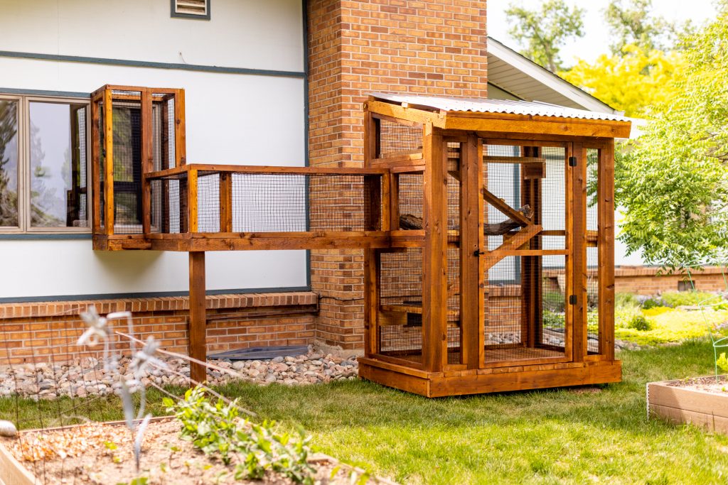 stained cedar catio in colorado with tunnel