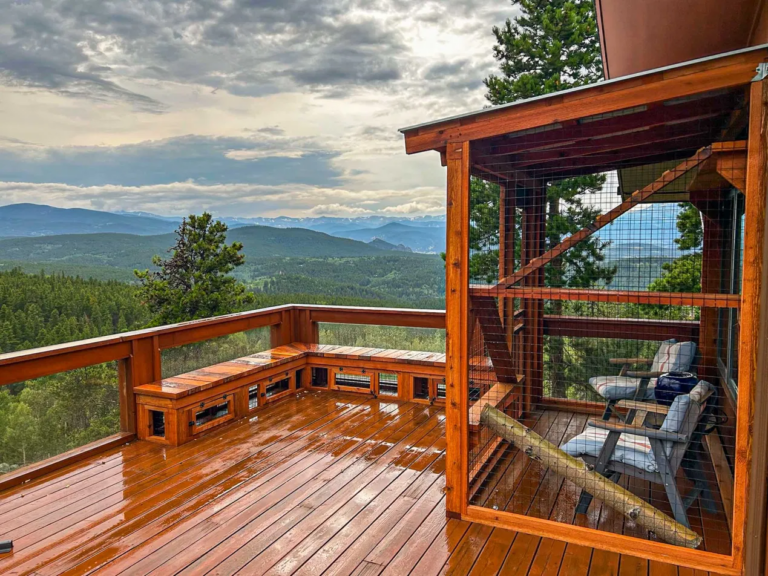 Large catio on a cedar deck overlooking the Rocky Mountains
